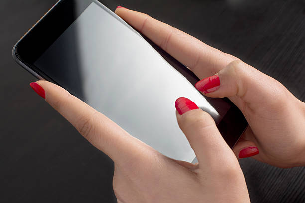 istock Holding 5.5inch Smartphone 470090548
