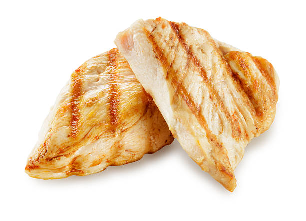 Prepared chicken meat. Breast fillet slices isolated. With clipping path. Prepared chicken meat. Breast fillet slices isolated. With clipping path. chicken breast photos stock pictures, royalty-free photos & images