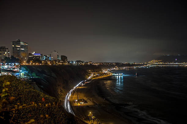Night time view of the Lima coastline stock photo