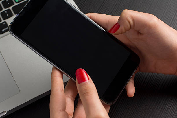 istock Holding 5.5inch Smartphone 470100228
