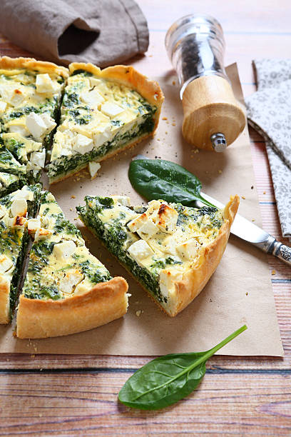 istock Pie with spinach and feta on a napkin 470100728