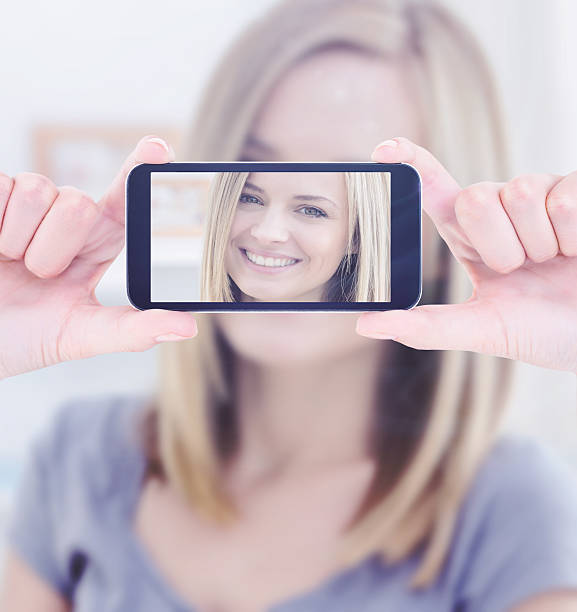 istock Composite image of hands holding smartphone 470101936