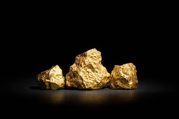 nuggets gold Closeup of big gold nuggets ounce stock pictures, royalty-free photos & images