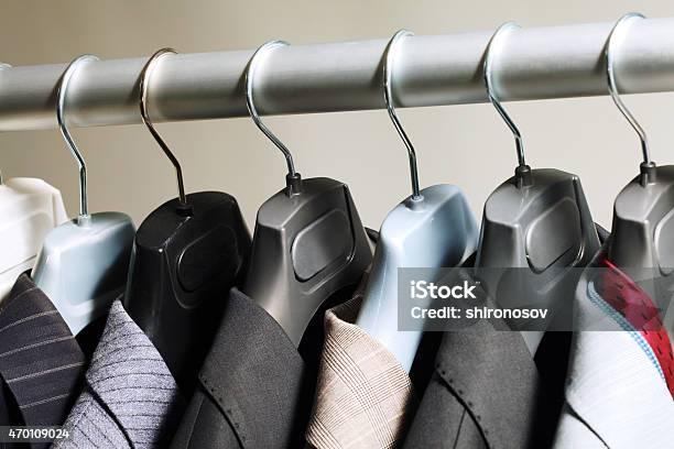 Hangers With Suits Stock Photo - Download Image Now - 2015, Boutique, Casual Clothing