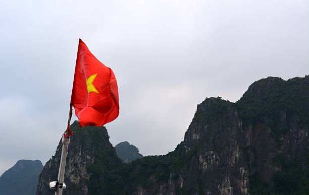 istock Vietnamese flag on Halong Bay, Vietnam 470112104