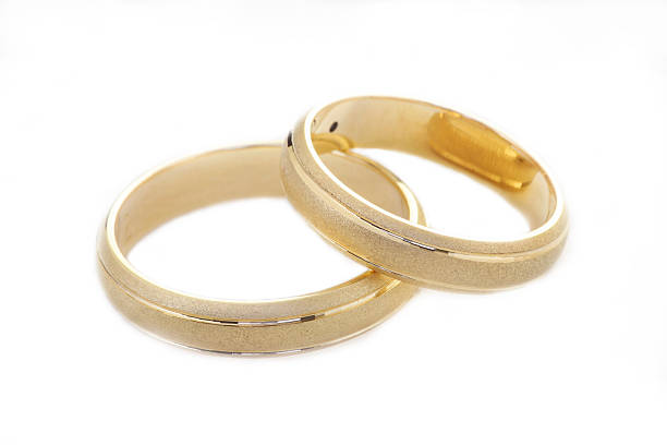 istock Two wedding golden rings isolated on white 470112168