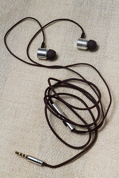 istock Headphones at the flax background. 470112270