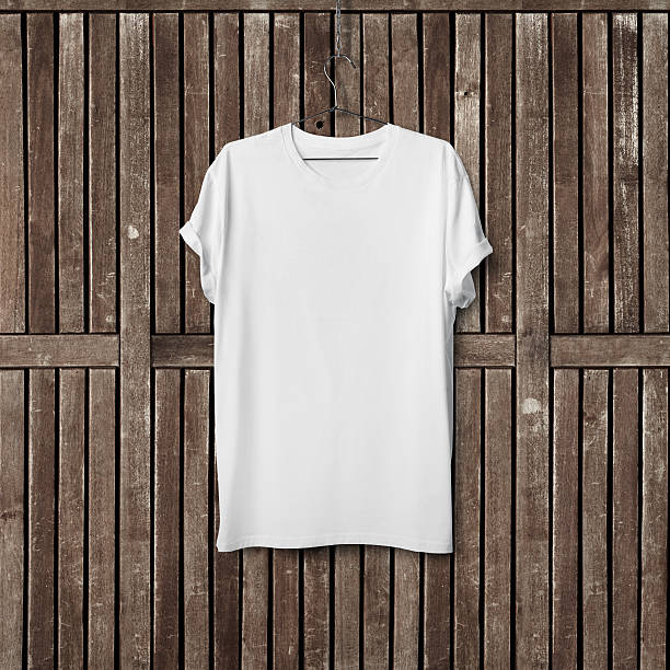 istock White blank t-shirt on wood wall 470112360
