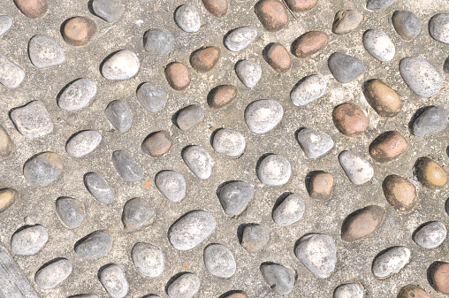 The Pebble Stone On Pavement For Foot Reflexology Pathway