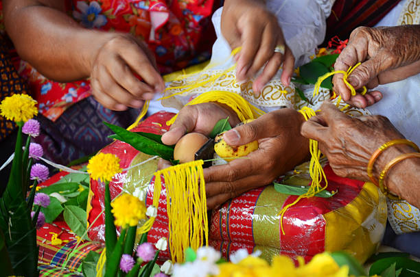istock Wrist Tying Thai blessing of Ordination ceremony 470132293