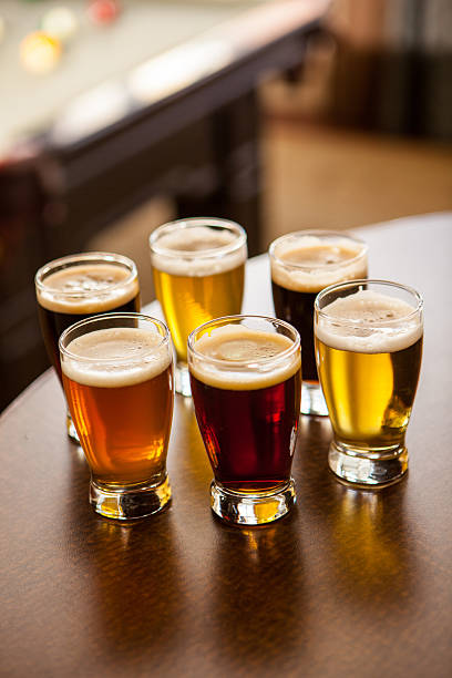 istock Six glasses of various types of beer on a table. 470134746