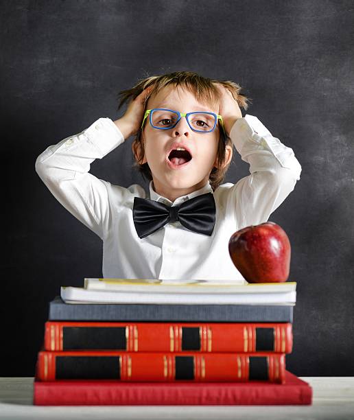 istock Child at School with hands in his Hairs 470134752