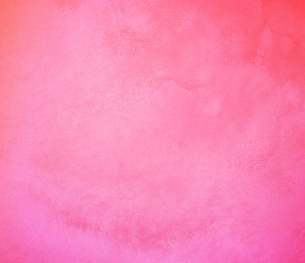Pink red color vintage soft grunge grain and dust surface rough textured graphic background.