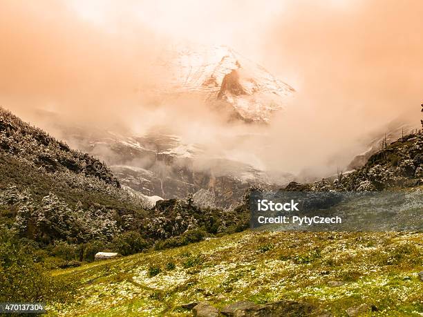 High Mountain Peak Covered With Fog Stock Photo - Download Image Now - 2015, Asia, Backgrounds