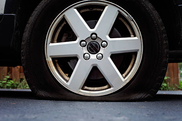 istock Driving down the road, trouble with a flat tire occurred 470138326