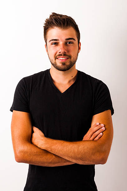 istock Young confident man with arms crossed 470141716