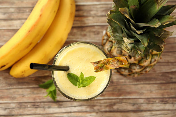 istock Overhead view of a pina colada with pineapple and bananas 470145106