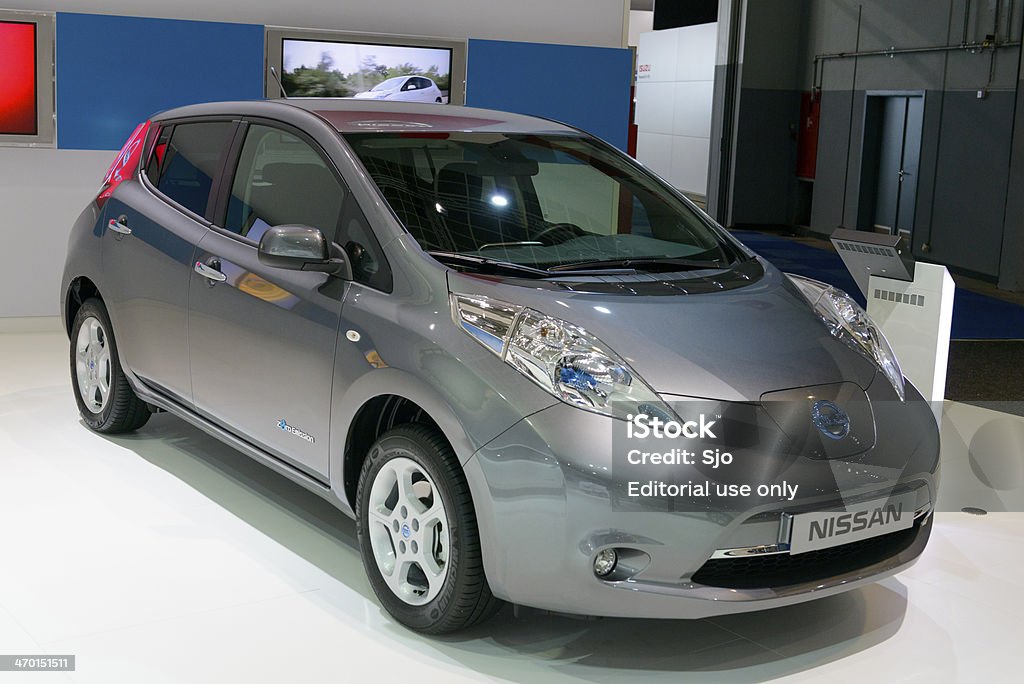 Nissan Leaf Brussels, Belgium - January 14, 2014: White Nissan Leaf full electric car on display at the 2014 Brussels motor show. Nissan Leaf Stock Photo