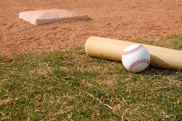 istock Baseball & Bat on the Field 470154213