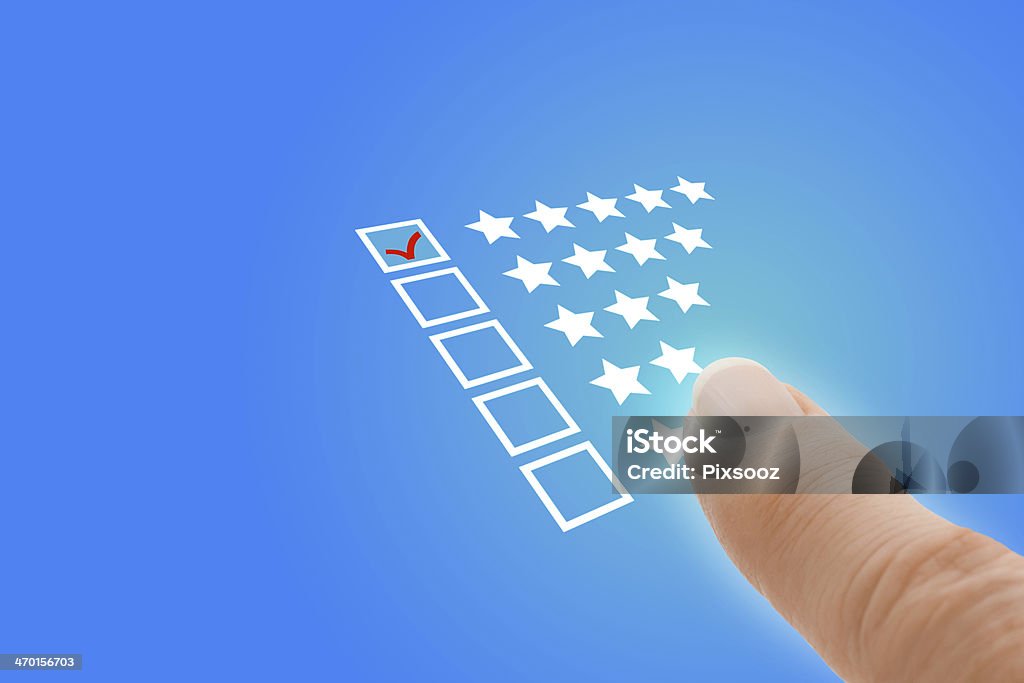 Online Survey with Finger Pointing at Excellent Tick Online survey questionnaire concept Abstract Stock Photo