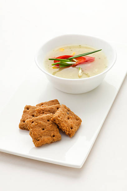 Sweet corn soup with chili peppers and spring onion stock photo