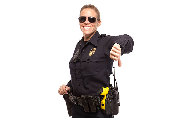 istock Police officer showing Thumbs down 470159908