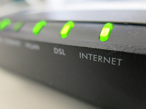 Close-up of functioning Internet modem Internet modem acute angle photos stock pictures, royalty-free photos & images