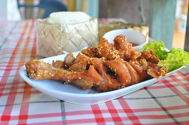 istock Thai style fried chicken with sticky rice 470161627