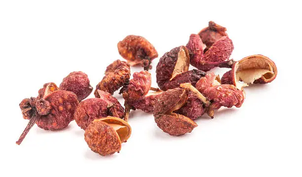 Sichuan pepper isolated on white background, macro