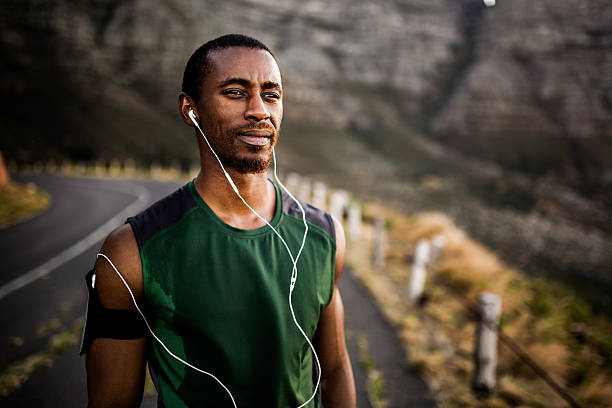 istock Athlete letting his music motivate him for his exercise 470163612