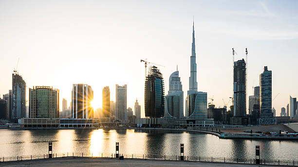 istock Dubai Business Bay commercial district silhouette panorama 470163640