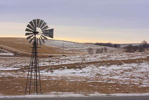 This old windmill has stood for decades on the Nebraska prairie near the small town of Howells in the northeast part of the state. 