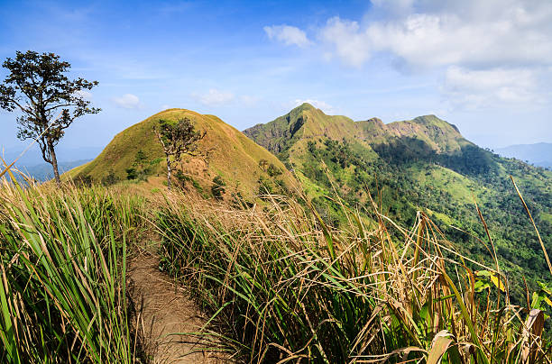 istock trails on the mountain peak  and blue sky 470166846