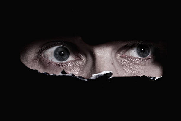 istock Scary eyes of a man spying 470167238