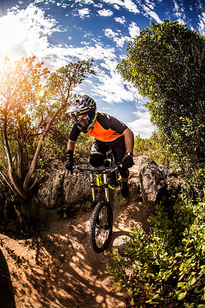 istock Mountain biker riding downhill on a on off-road trail 470167602