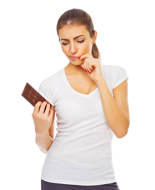 istock Young healthy woman with chocolate 470168327