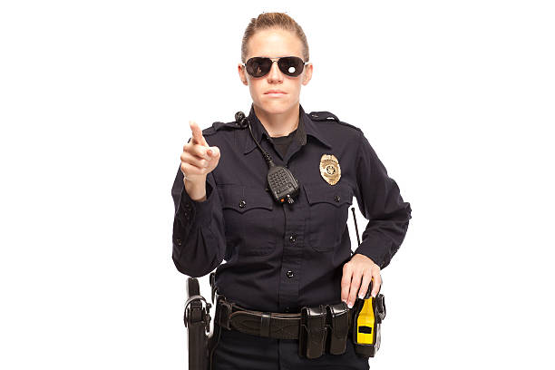 istock Female police officer pointing finger 470168352