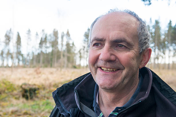 istock Smiling handsome man in nature 470168438