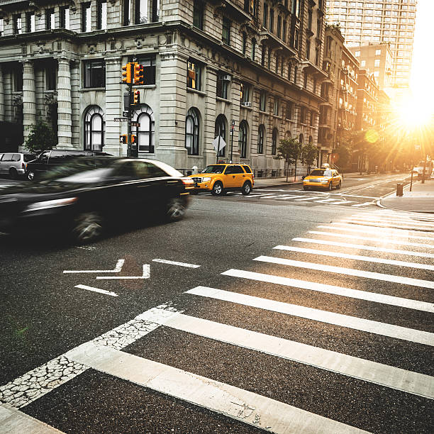 taxi running fast on nyc taxi running fast on nyc car city urban scene commuter stock pictures, royalty-free photos & images