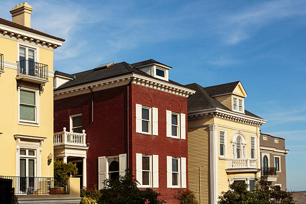 istock Row of upscale houses against blue sky 470169693