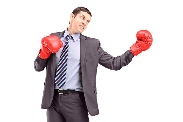 istock Young businessman posing with red boxing gloves 470171143