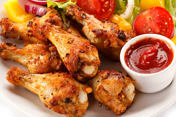 istock Grilled chicken wings and vegetables 470171494