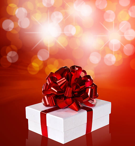 istock Gift in box with red ribbon and bow 470172541