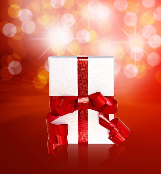 istock Gift in box with red ribbon and bow 470172603
