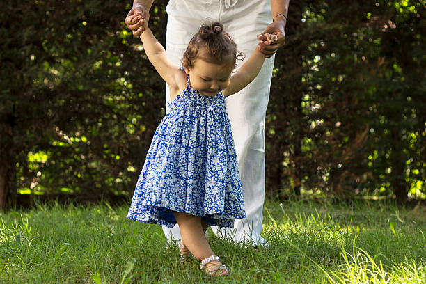 istock Lovely Baby Learn to Walk 470173368