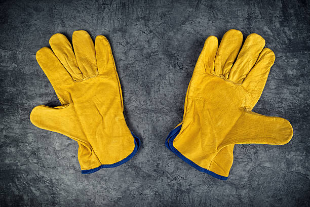 istock Pair of Yellow Leather Construction Work Gloves 470173394