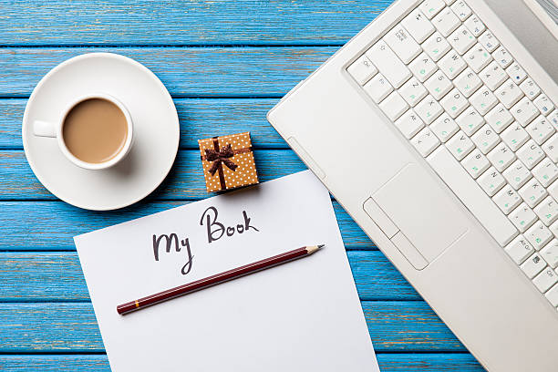 istock Coffee and paper with My Book inscription near notebook 470174480