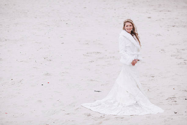 istock wedding on the beach in winter 470174828