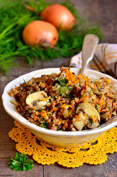 istock Buckwheat with fried mushrooms and vegetable. 470176560