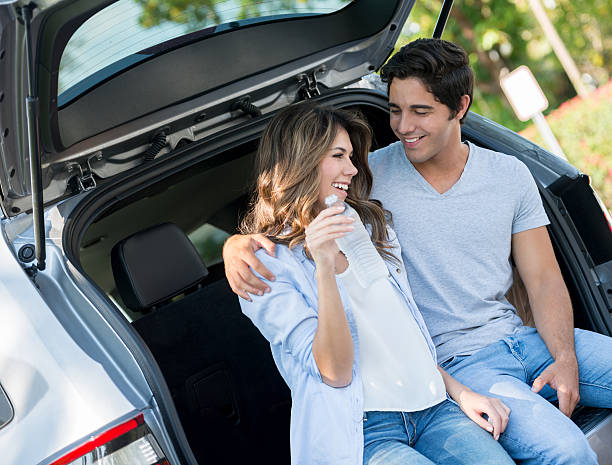 istock Happy young couple on a road trip 470177424